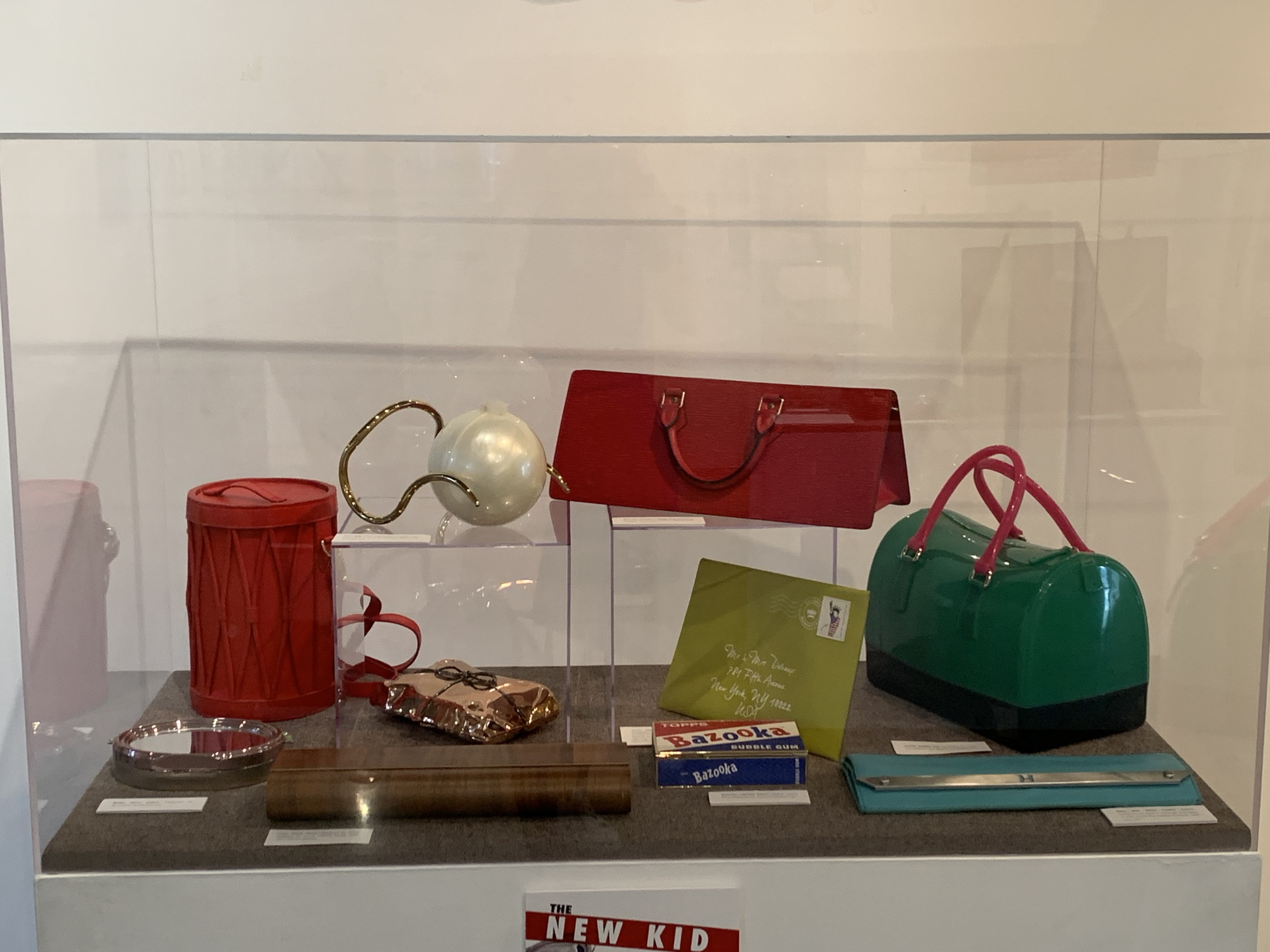 Installation View of the exhibition “PURSEonality; A Stylish Handbag History,” Gallery 109 and Anthony R. Abraham Family Gallery, Coral Gables Museum.