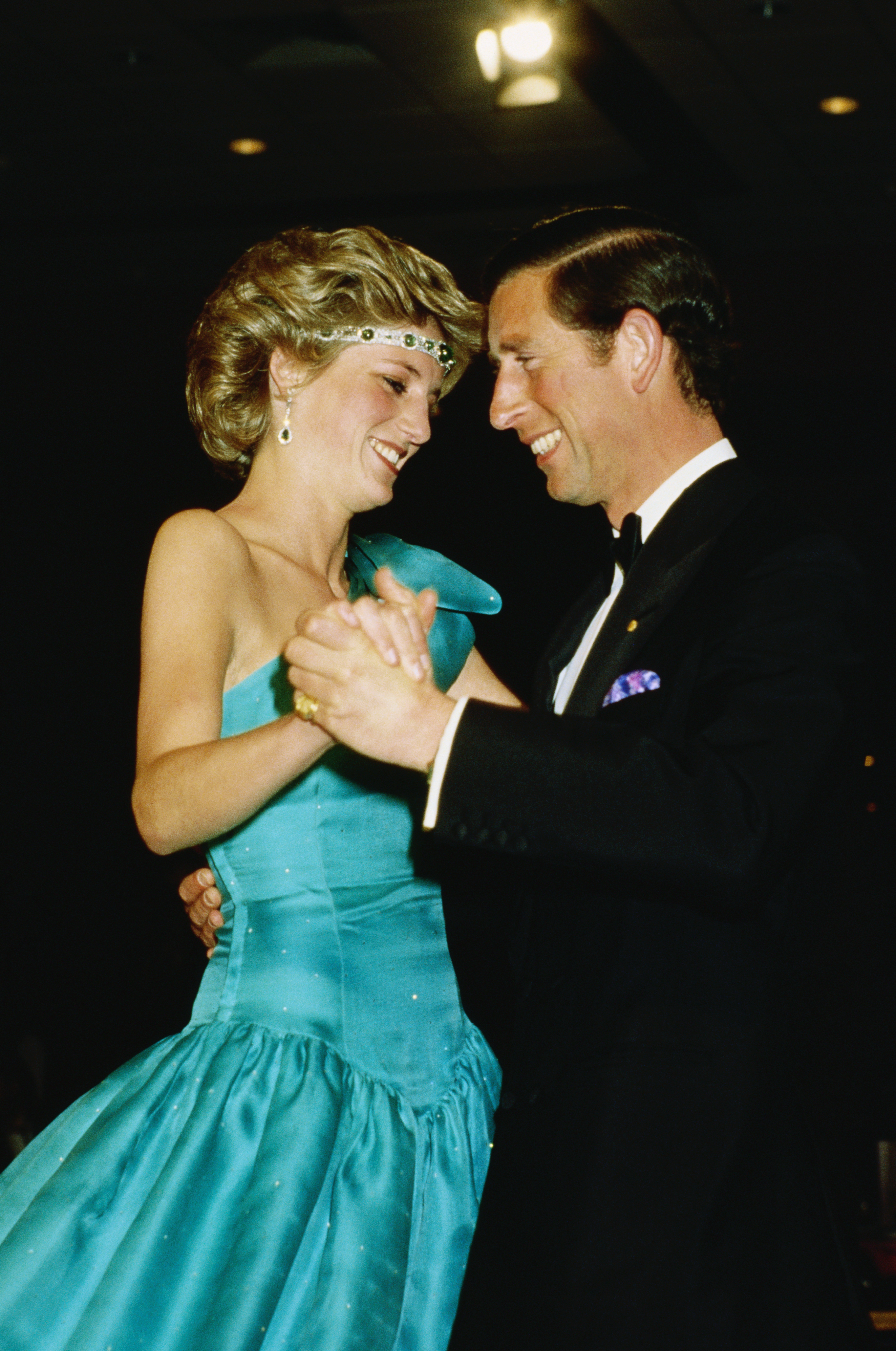 Princess Diana and Prince Charles dance at a formal event