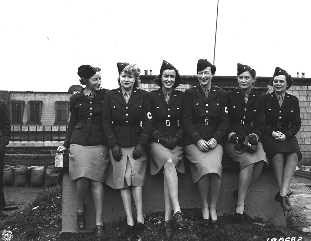 Caption: Six female war correspondents who covered the U.S. Army in the European Theater during World War II appear together in this 1943 photograph: Mary Welch, Dixie Tighe, Kathleen Harriman, Helen Kirkpatrick, Lee Miller, Tania Long