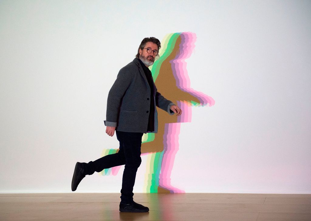 Danish-Icelandic artist Olafur Eliasson poses in front of his artwork “Your uncertain shadow” during a presentation of the “Olafur Eliasson: In real life” exhibition at the Guggenheim Museum in northern Spanish Basque city of Bilbao on February 13, 2020